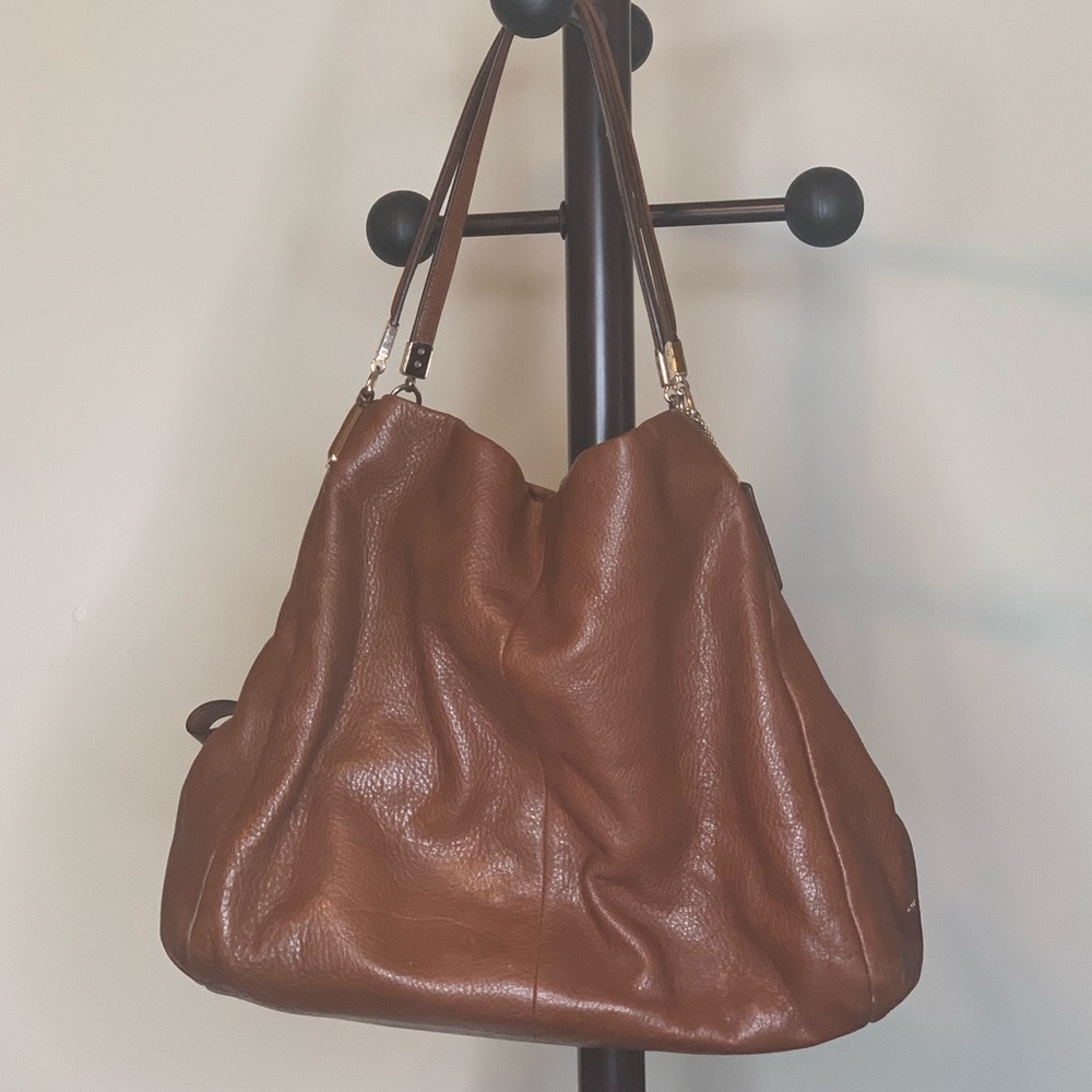 Brown leather Coach hand bag